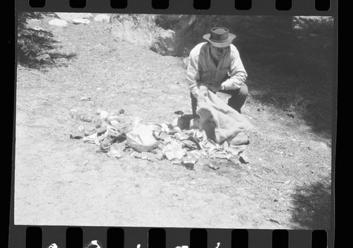 Backcountry cleanup, M. Thede with trash collected