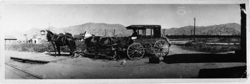 Military Administration, Government, "Doughtery Wagon" waiting at the station or "railhead" of the Visalia Electric, which in 1906 was a steamroad. They ran a combination "The Cannon Ball" two times