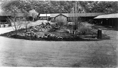 Construction, placing curbing around island in utility area