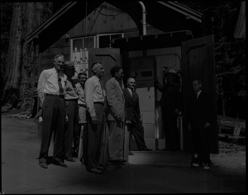 Dedications and Ceremonies, Last connection to turn electric power on at Giant Forest. NPS Groups, Park Superintendents. L. to R. ?, Asst. Supt. George Walker, Administrative Officer Fritz Novak, ?