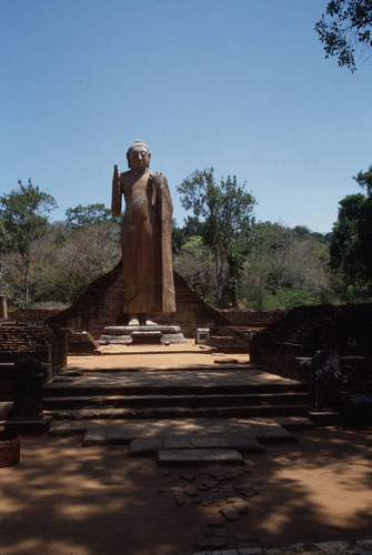 Standing Buddha statue in image house: Patima Vihāra or Ariyākara Vihāra (Mahāvamsa)