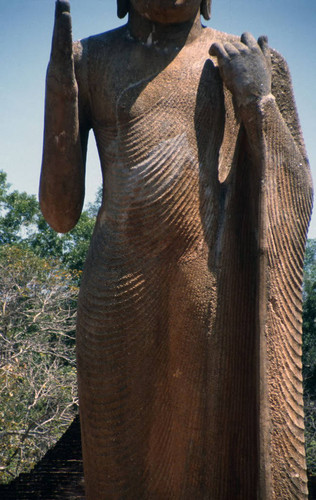 Standing Buddha statue in image house: Patima Vihāra or Ariyākara Vihāra (Mahāvamsa)