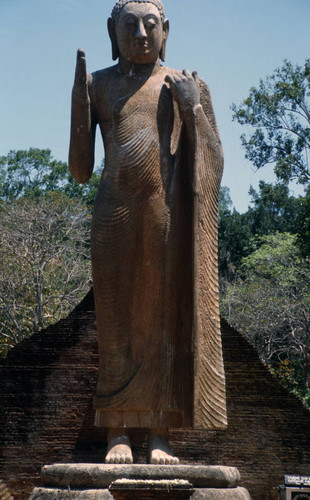 Standing Buddha statue in image house: Patima Vihāra or Ariyākara Vihāra (Mahāvamsa)