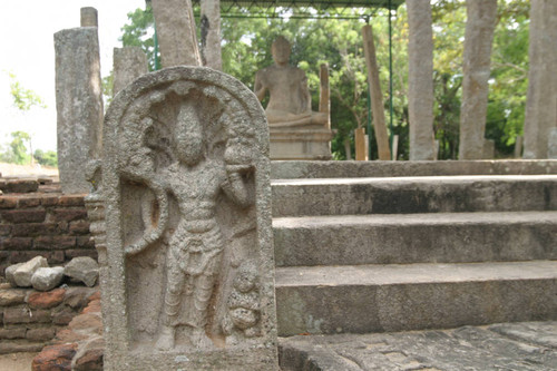 Monastery: Image house: Seated Buddha statue: Virāsana: Abhaya mudrā: Nunnery: Guardstone