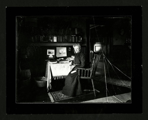 Ellen Browning Scripps in her library at South Molton Villa