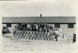 Men with tea crates