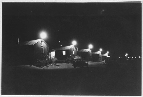 Camp buildings at night