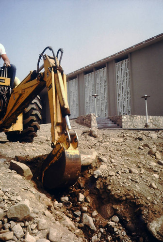 Scott Hall landscaping with backhoe