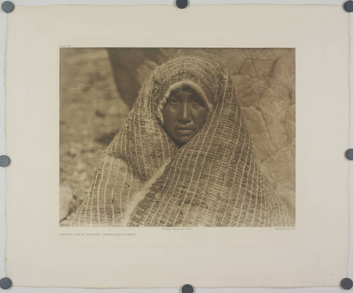 Nootka woman wearing cedar bark blanket