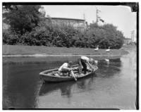 William Kane and Jack Clements, dredging Palace of Fine Arts lagoon for body