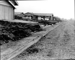 Street and curb grading in Rincon Valley Homes subdivision in the Mission Blvd.-Yukon Drive area