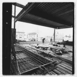 Construction worker clipping forms for second floor of the new Exchange Bank building, 545 Fourth Street, Santa Rosa, California, 1971