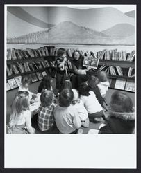 Librarian Joanne Hockett reading to Sebastopol area children, Sebastopol, California, 1977?