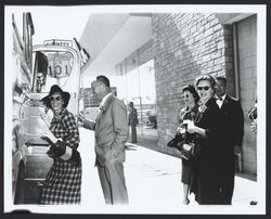 Large group at G.K. Hardt preparing to board buses to San Francisco, Santa Rosa, California, 1960