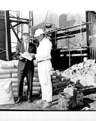 Two unidentified men at Santa Rosa Garden Apartments construction site, Santa Rosa, California, 1969