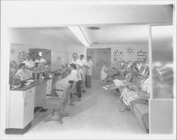 Male hair stylists and customers at the House of Charles, Santa Rosa, California, 1958