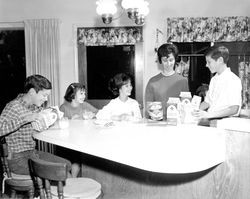 Serving Clover Dairy products at home, Sonoma County, California, 1968
