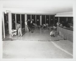 Laying tile floors at the Flamingo Hotel, Santa Rosa, California, 1957