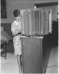 Unidentified women working at office machinery in Summit Savings and Loan, Santa Rosa, California, 1966