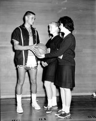 Sonoma State College basketball players and cheerleaders, 1964