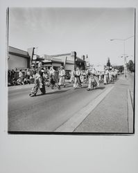 Shriners marching in a Guerneville parade, Guerneville, California, 1978