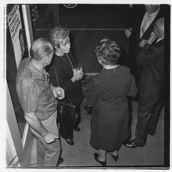 Three attendees at the Zumwalt Chrysler-Plymouth Center Open House, Santa Rosa, California, 1971