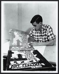 Man holding an Artrium poster, Santa Rosa, California, 1966