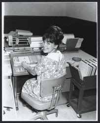 Unidentified women working at office machinery in Summit Savings and Loan, Santa Rosa, California, 1966