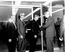 Ribbon cutting at entrance to Coddingtown Branch of United California Bank