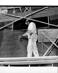 Applying Calaveras Plastic to exterior of the Santa Rosa Garden Apartments