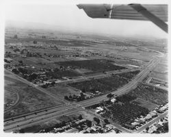 Aerial view of Coddingtown, Guerneville Road, Steele Lane, Highway 101 area, Santa Rosa, California, 1962