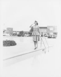 Layered top and pleated skirt modeled in the Dramatic Moods of Autumn Fashion Show, Santa Rosa, California, 1959