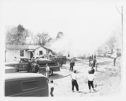 Burning down buildings in 2900 block of 4th Street, Santa Rosa, California, 1957