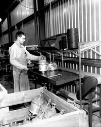 People doing various jobs at the MGM Brakes plant