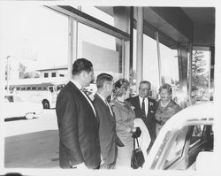 Large group at G.K. Hardt preparing to board buses to San Francisco, Santa Rosa, California, 1960