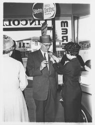 Large group at G.K. Hardt preparing to board buses to San Francisco, Santa Rosa, California, 1960