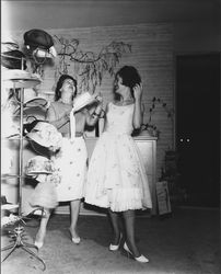 Ceci showing hats to Carolyn, Santa Rosa, California, 1961