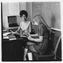 Mrs. Lillian Gorwig working with a student in her shorthand class at Luther Burbank College of Commerce, Santa Rosa, California, 1971