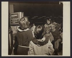 Children dressed as elves at Sears opening day, Santa Rosa, California, 1980