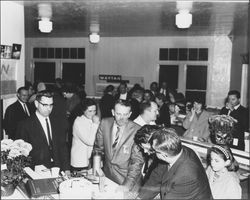 Robert Fountain talks to open house attendees at The Washing Machine Man, Santa Rosa, California, 1965