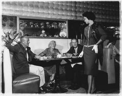 Knee-length skirt and tailored top modeled in the "Dramatic Moods" fashion show in the Topaz Room, Santa Rosa, California, 1959