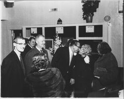 Elegantly dressed open house attendees at The Washing Machine Man, Santa Rosa, California, 1965