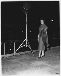 Wool jacket, skirt and fox stole modeled in the Aqua Varieties fashion show at the Swim Center, Santa Rosa, California, 1959