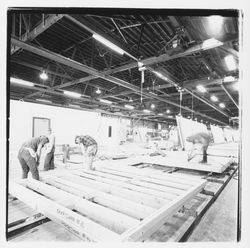 Workers construct portable building walls at Speedspace Corporation, 920 Shiloh Road, Windsor, California, 1971