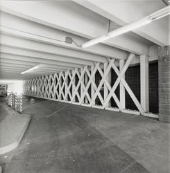 Views of wooden timber and steel beam reinforcements inside the B Street parking garage, Santa Rosa, California, November 26, 1968