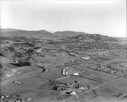 Aerial view looking southeast from Highway 101 and the Mendocino Avenue offramp, Santa Rosa, California, February 11, 1965
