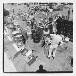 Glass sorting barrels and workers at the Recycling Center, Santa Rosa, California, 1971