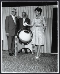 Charlotte Townsend, Miss Sonoma County drawing a name at the Electrical Show, Santa Rosa, California, 1961