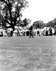 Golfers at opening day at Oakmont Golf Course