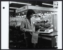 Weighing nails at Yaeger and Kirk, Santa Rosa, California, 1978